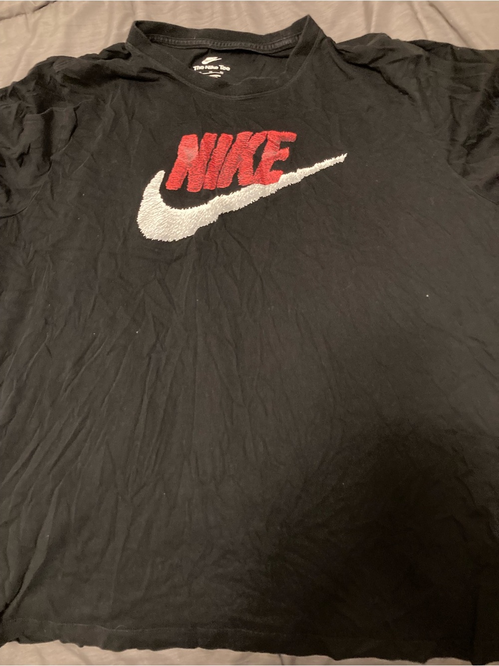 Nike Black Short Sleeve Tee with Red Logo and White Swoosh
